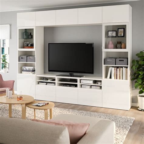 Besta entertainment center - May 8, 2018 · IKEA Besta is actually a TV unit but you may give it a lot of cool looks to fit your interior and just to stand out a bit. Paint it, add a wooden top, change handles for cool leather pulls, for bold geode knobs or anything else that you like. Vary open and closed storage compartments and attach the piece to the wall to make a floating look. 